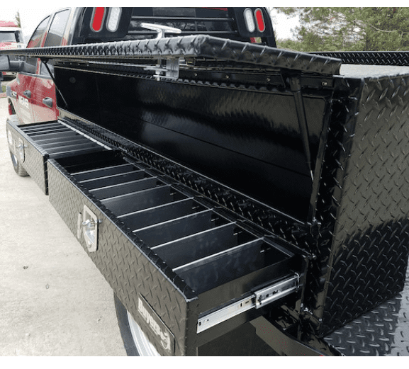 Contractor series toolbox mounted on truck shown with doors and drawers open.