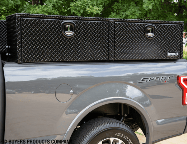 Side view of pickup truck with black diamond topsider tool box.