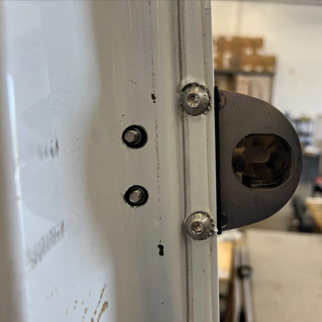 Interior view of a Lock Dog installed on a cargo van.