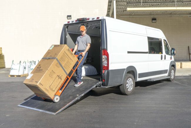 Check out our ramp installed on a Ford Transit shown fully open with man loading an appliance.